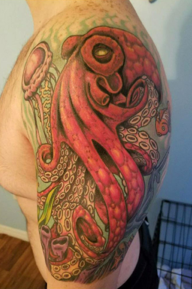 octopus tattoo, underwater themed half sleeve done by fish at